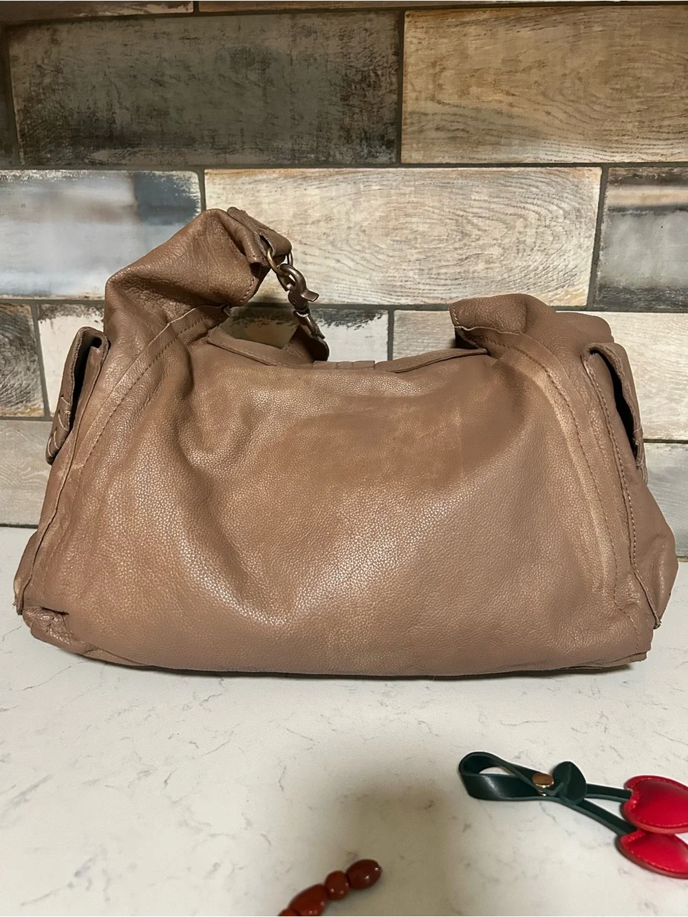 LIKE NEW We The Free Leigh Hobo Distressed Leather Tote in Saddle With Charms
